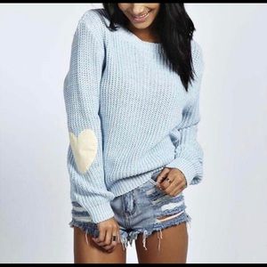 Fashion sweater, long heart pattern sleeves.